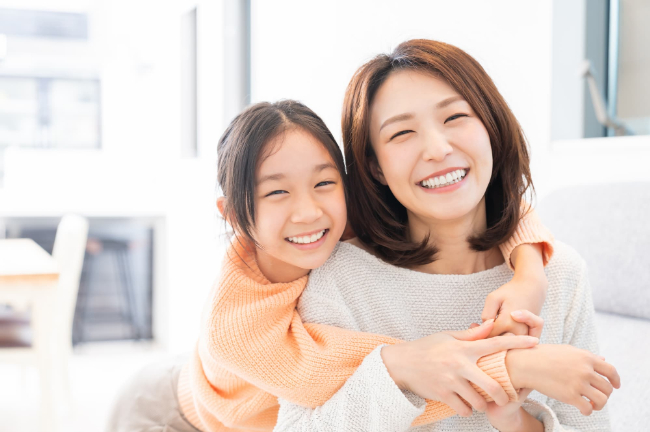 笑顔の母娘