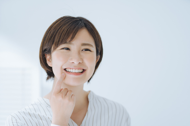 歯石予防をして歯の健康をも守る女性