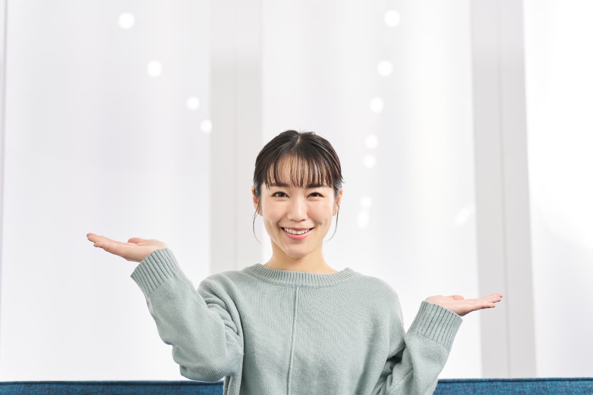 定期検診とクリーニングの違いを伝える女性